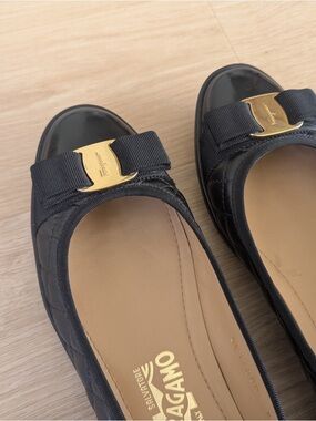 Salvatore Ferragamo Black Quilted Ballet Flats with Gold Hardware